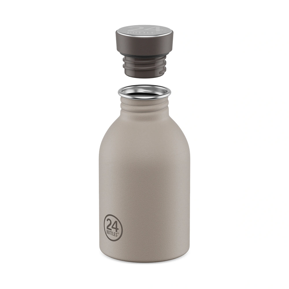 The Linen mini bottle with the cap unscrewed