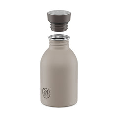 The Linen mini bottle with the cap unscrewed